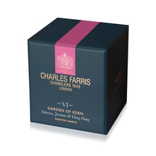 Load image into Gallery viewer, Charles Farris 'Garden of Eden' scented candle in its dark navy blue packaging box, featuring a vibrant pink band with the brand's crest and gold lettering.