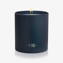 Load image into Gallery viewer, A dark navy blue matte candle in a matching cylindrical jar, lit with a small flame and featuring the Roman numeral 'VIII' printed in gold near the bottom, set against a clean white background.
