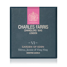Load image into Gallery viewer, Charles Farris Chandler's 1845 London scented candle box, featuring a dark slate blue cover with a vertical pink crest band and white text for the Garden of Eden scent.
